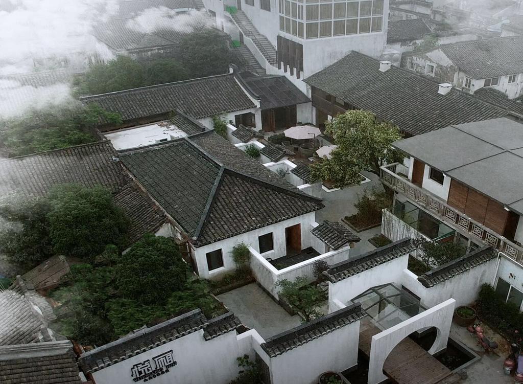 Floral Hotel - Yuexiang Inn Wuzhen Jiaxing Exteriör bild
