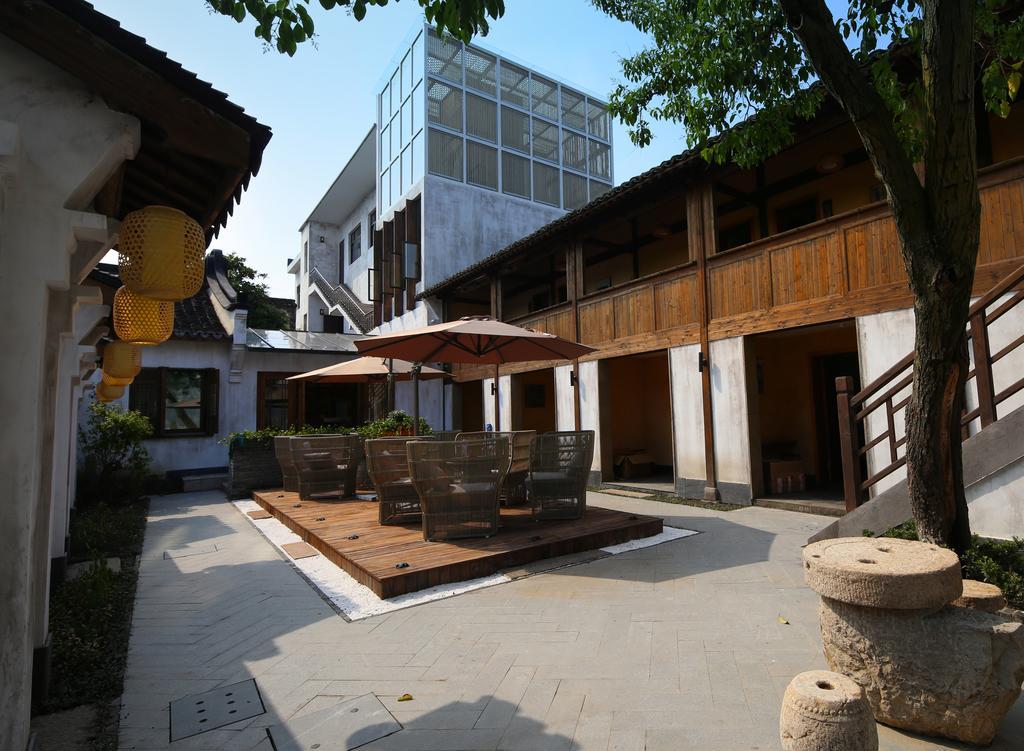 Floral Hotel - Yuexiang Inn Wuzhen Jiaxing Exteriör bild