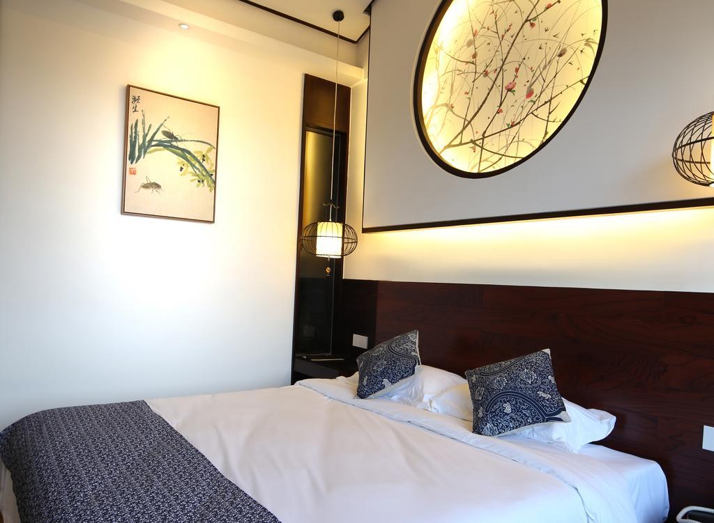 Floral Hotel - Yuexiang Inn Wuzhen Jiaxing Exteriör bild