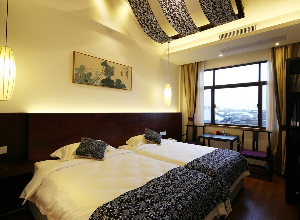 Floral Hotel - Yuexiang Inn Wuzhen Jiaxing Exteriör bild